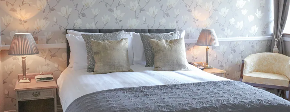 A classic bedroom at Llechwen Hall